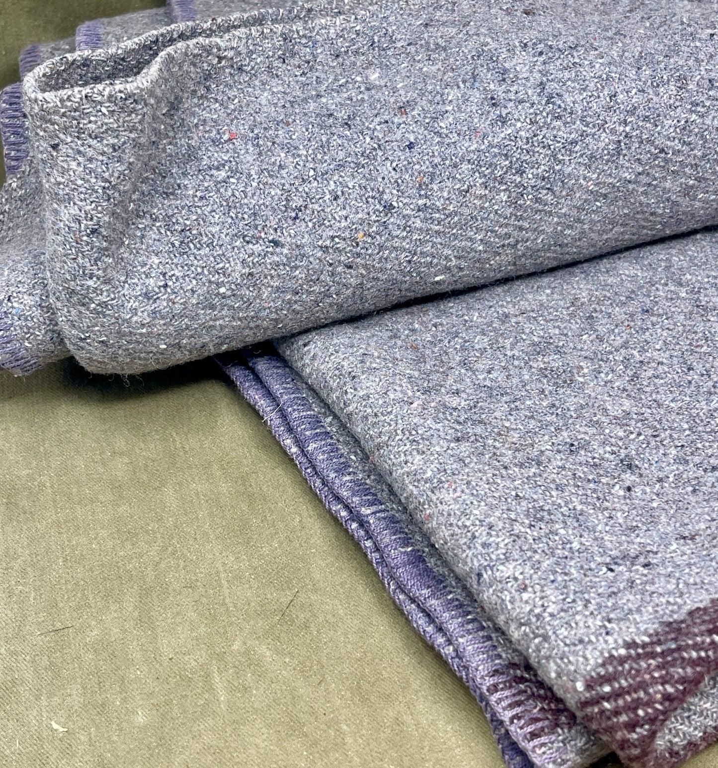 Close-up of textured fabric with a neutral background