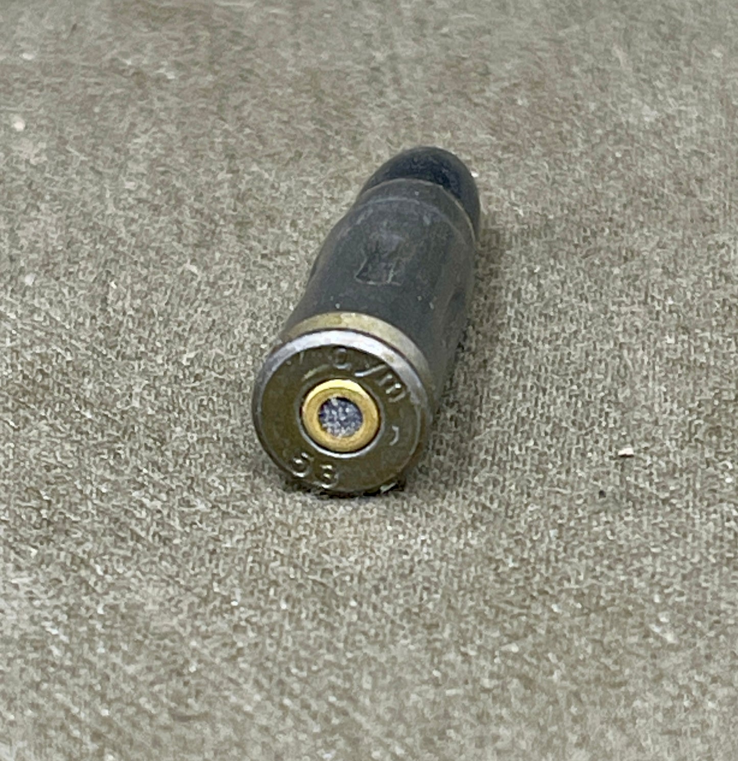 Bullet casing on a textured surface