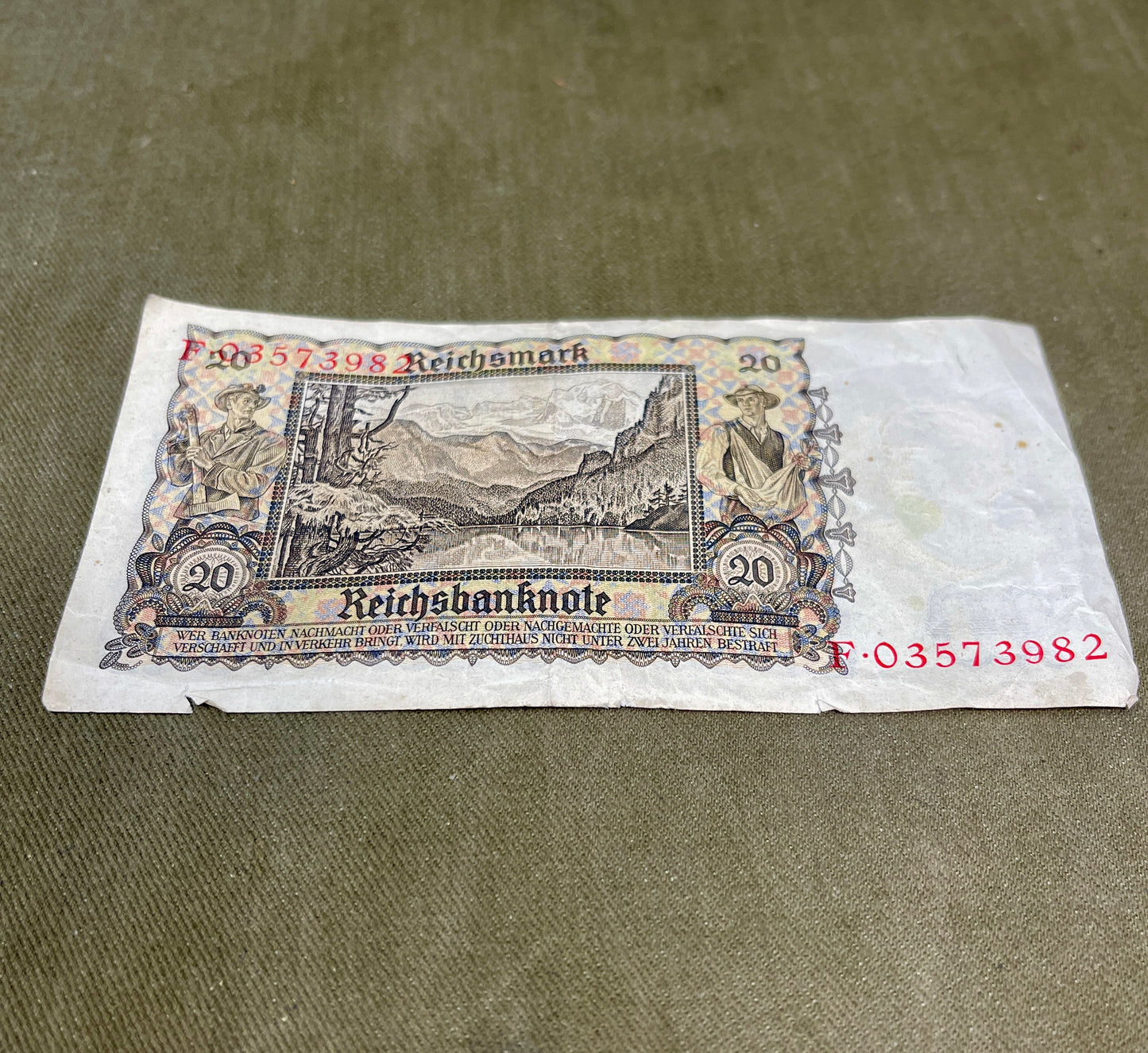 Vintage German Reichsbanknote banknote on a textured surface