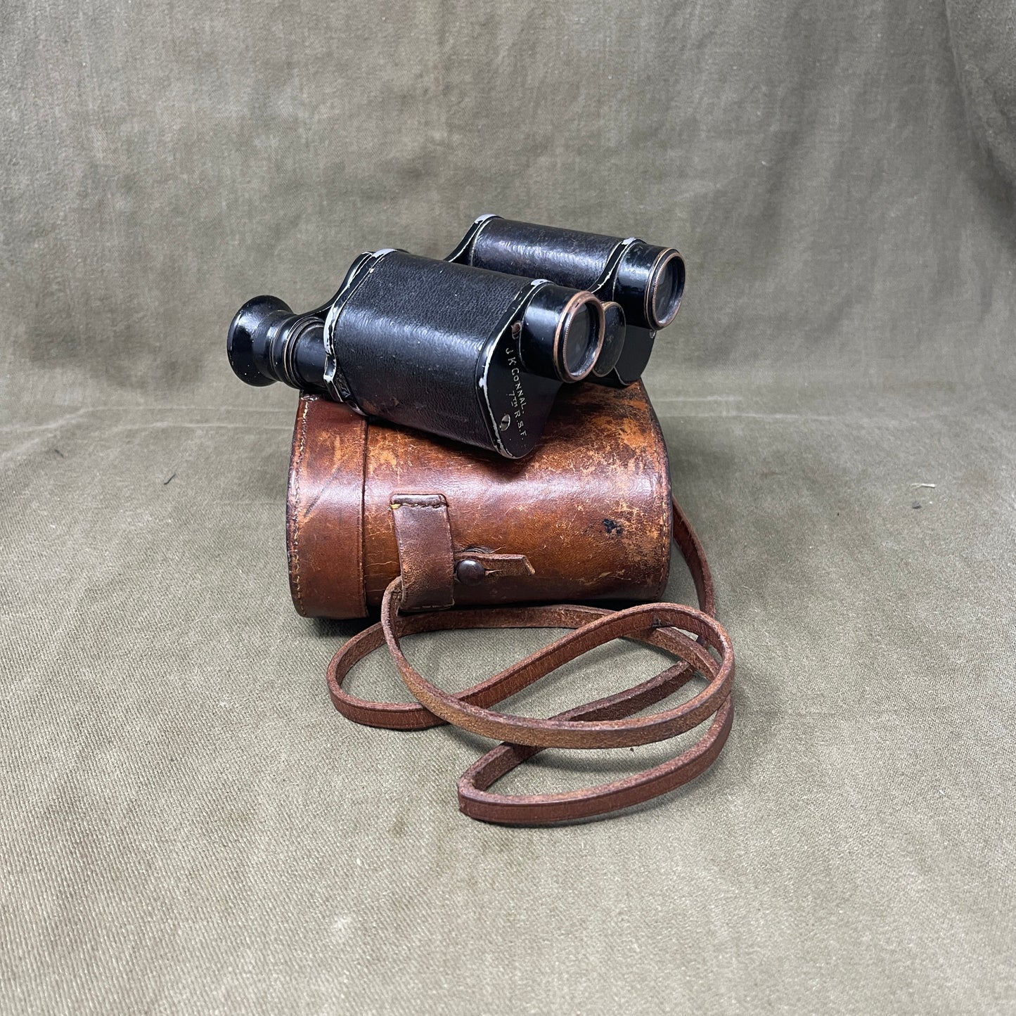 A WW1 set of binoculars made by Zeeda Paris Named to J.K Connal 7th R.S.F.