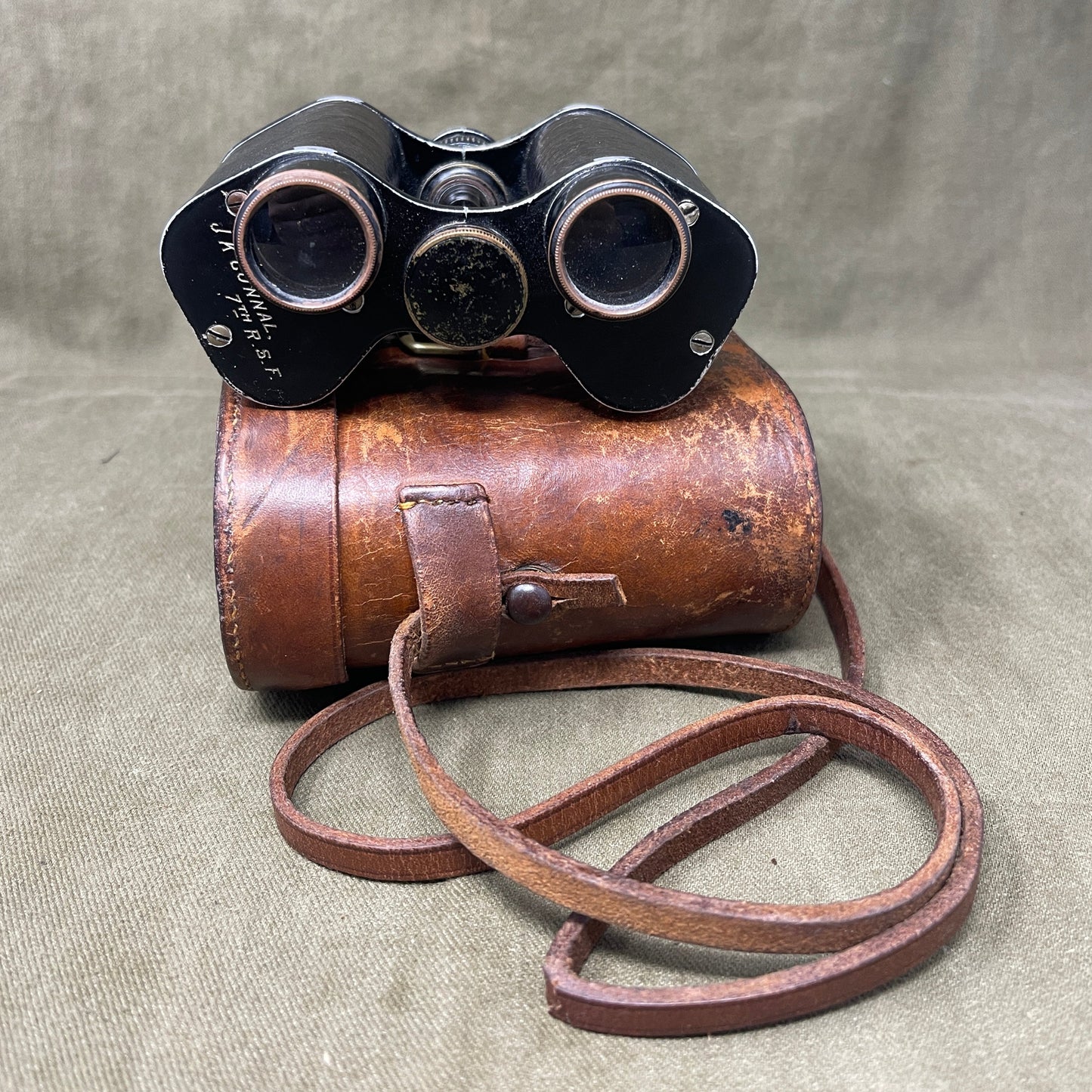 A WW1 set of binoculars made by Zeeda Paris Named to J.K Connal 7th R.S.F.