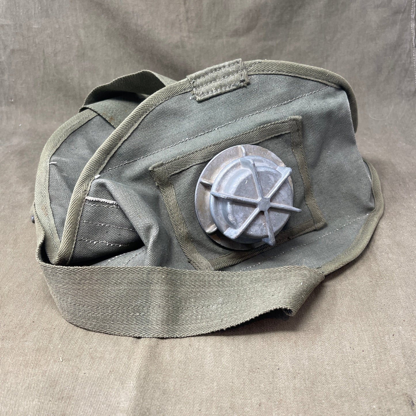 200 word description for Original British Army 1945 Dated 44 Pattern Jungle Water Carrier