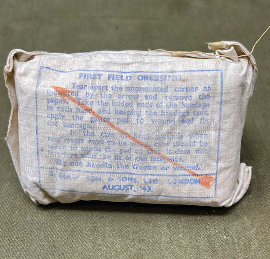 This Large First Aid Dressing, manufactured by T.J. Smith & Nephew Ltd in Hull, England, is a vintage medical supply that highlights the craftsmanship and practical design of mid-20th-century healthcare essentials. Known for its reliability and quality, Smith & Nephew was a renowned manufacturer of medical and surgical products, and this dressing reflects their commitment to excellence.
The dressing is designed for emergency use, providing a sterile and absorbent solution for treating wounds, cuts, or inju