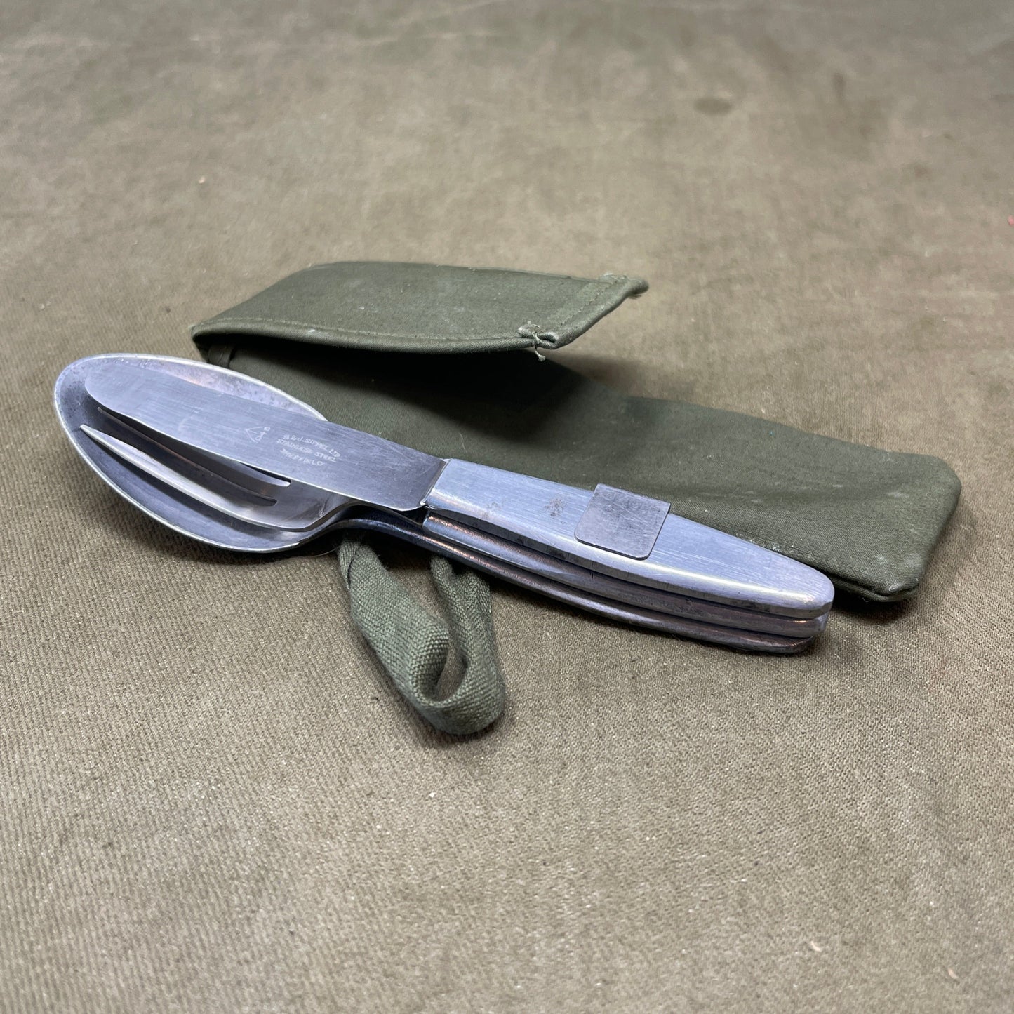 Knife, fork, and Spoon set dated 1945 Compactium