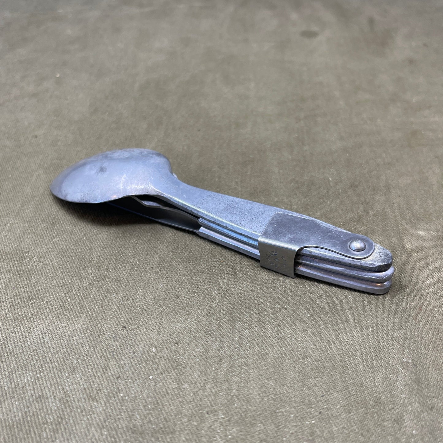 Knife, fork, and Spoon set dated 1945 Compactium