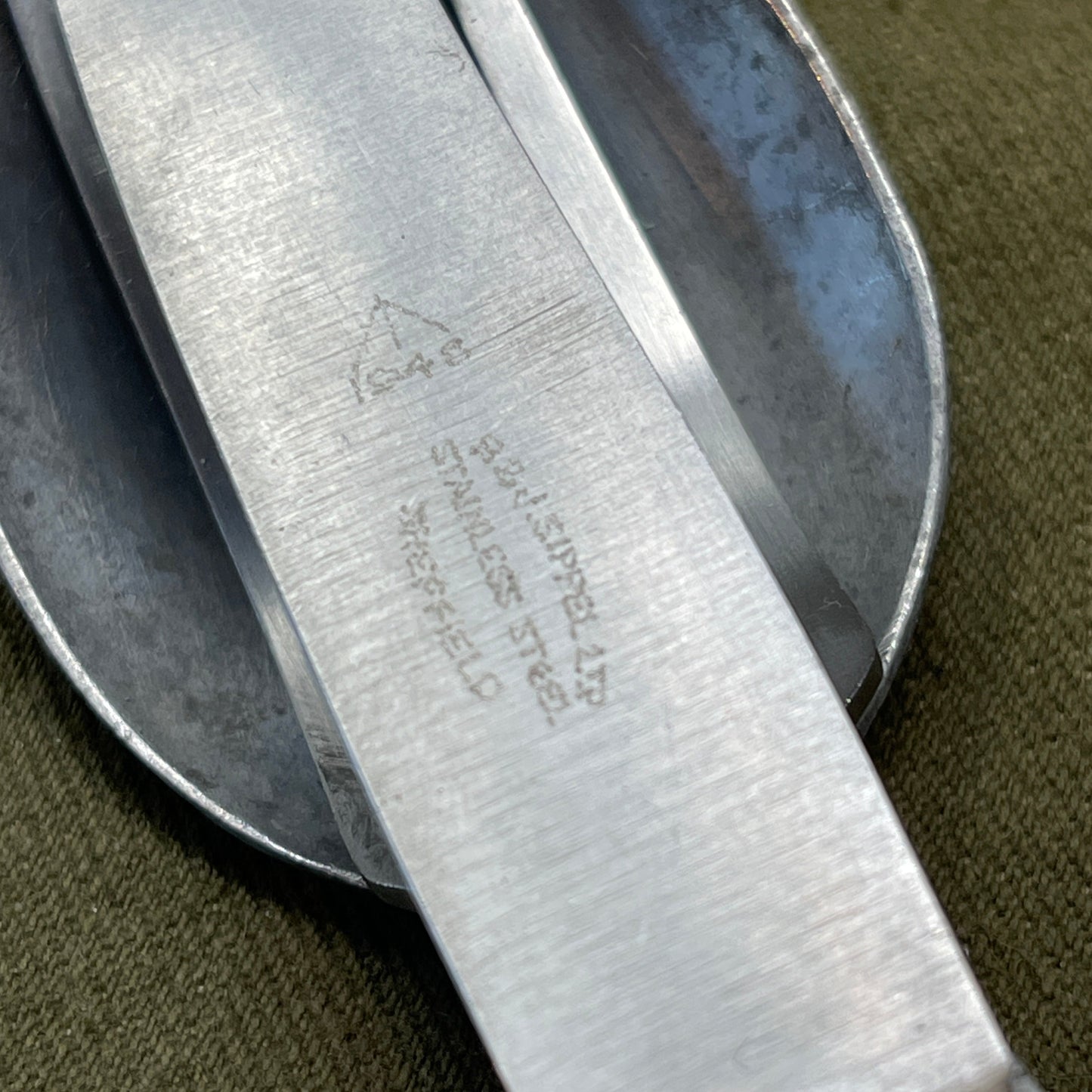Knife, fork, and Spoon set dated 1945 Compactium