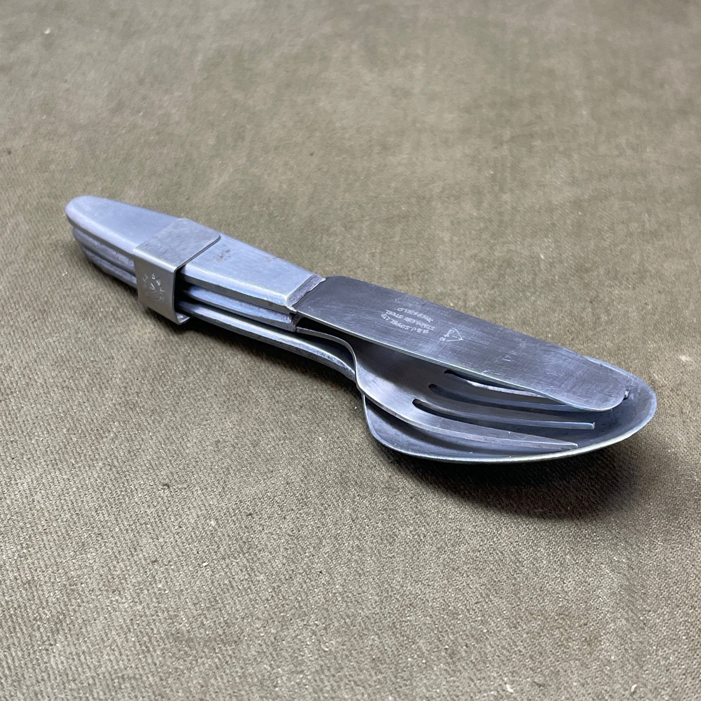 Knife, fork, and Spoon set dated 1945 Compactium
