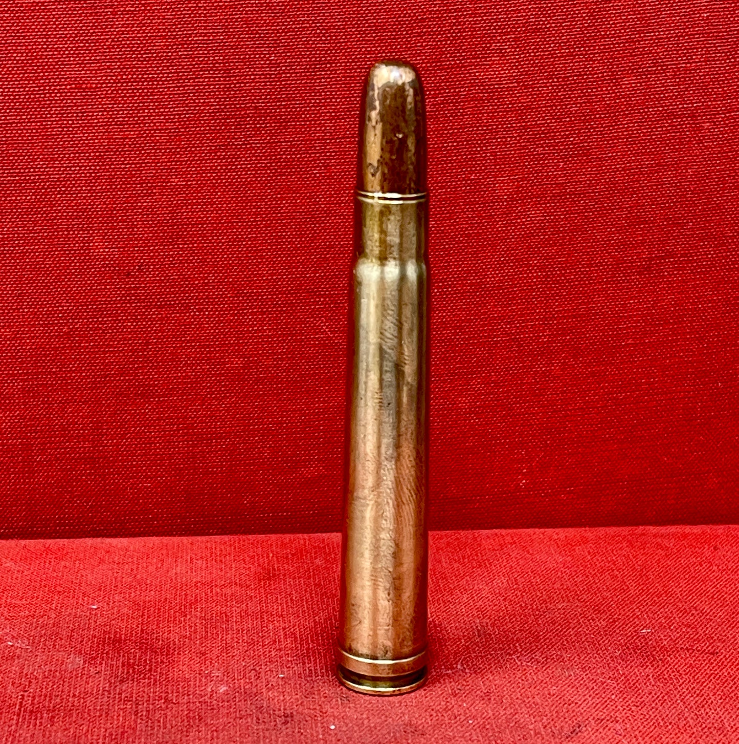 "Explore the INERT H&H .375 Magnum W-W Super Cartridge, a deactivated collectible showcasing big game hunting history and exceptional craftsmanship."