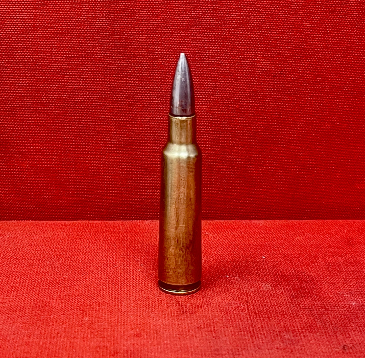 "Discover the INERT REM-UMC .260 HR round, a deactivated collectible showcasing early American ammunition craftsmanship and the legacy of the Union Metallic Cartridge Company."