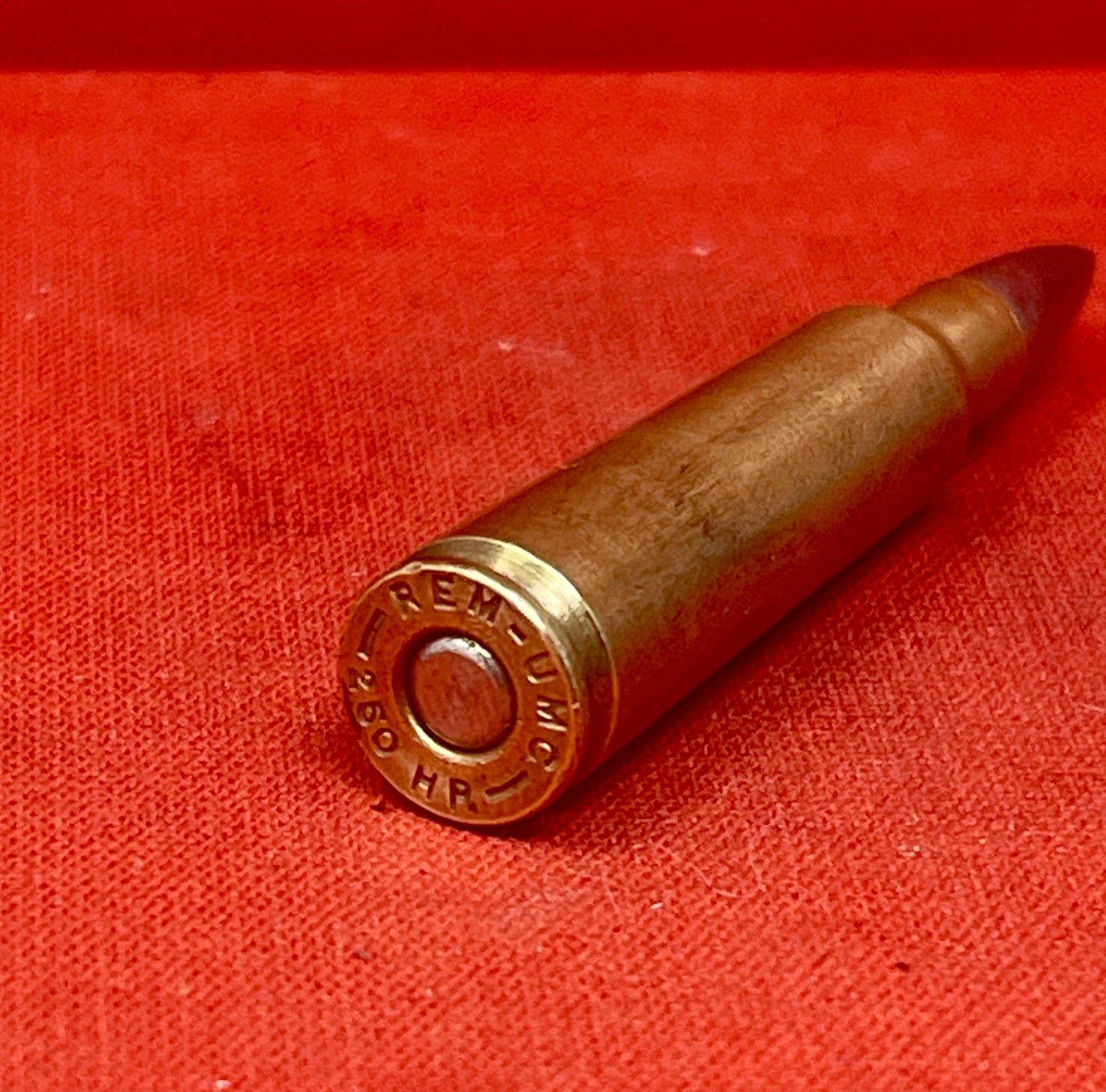 "Discover the INERT REM-UMC .260 HR round, a deactivated collectible showcasing early American ammunition craftsmanship and the legacy of the Union Metallic Cartridge Company."