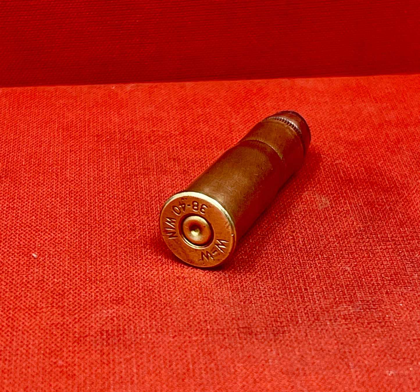The INERT W-W .38-40 Winchester round is a remarkable piece of vintage ammunition history, offering insight into the evolution of firearms and ammunition design. Originally introduced in 1874 for the Winchester Model 1873 lever-action rifle, the .38-40 Winchester was a popular cartridge for both rifles and revolvers during the late 19th and early 20th centuries. Despite its designation, the .38-40 is a .40 caliber cartridge with a bottlenecked case, making it a versatile option for hunting, sport shooting,