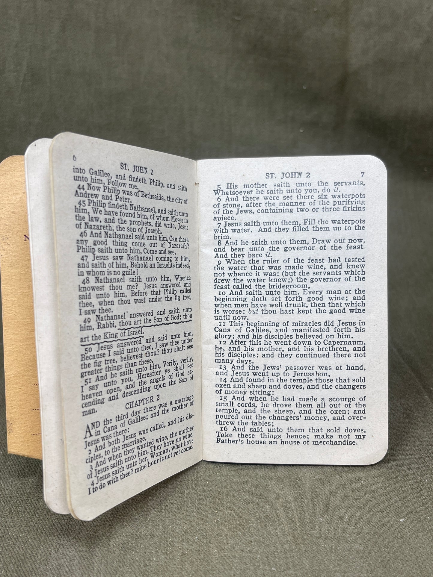 The Gospel of St. John: Active Service Edition was a compact, pocket-sized scripture booklet issued to British and Commonwealth soldiers during World War II. Designed to fit in a battle blouse pocket, this special edition provided spiritual support to troops facing the hardships of war. Often featuring a message from King George VI, it was distributed by religious organizations like the Scripture Gift Mission. The booklet served as a source of comfort, faith, and resilience on the front lines. Today, surviv