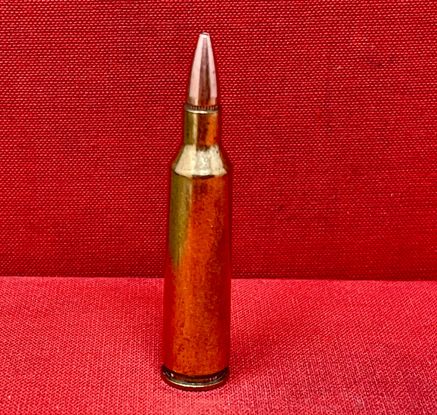 The .22-250 INERT Brass Cartridge is a non-functional, high-quality collectible round ideal for firearm function testing, educational purposes, and display. A must-have for ammunition collectors.
