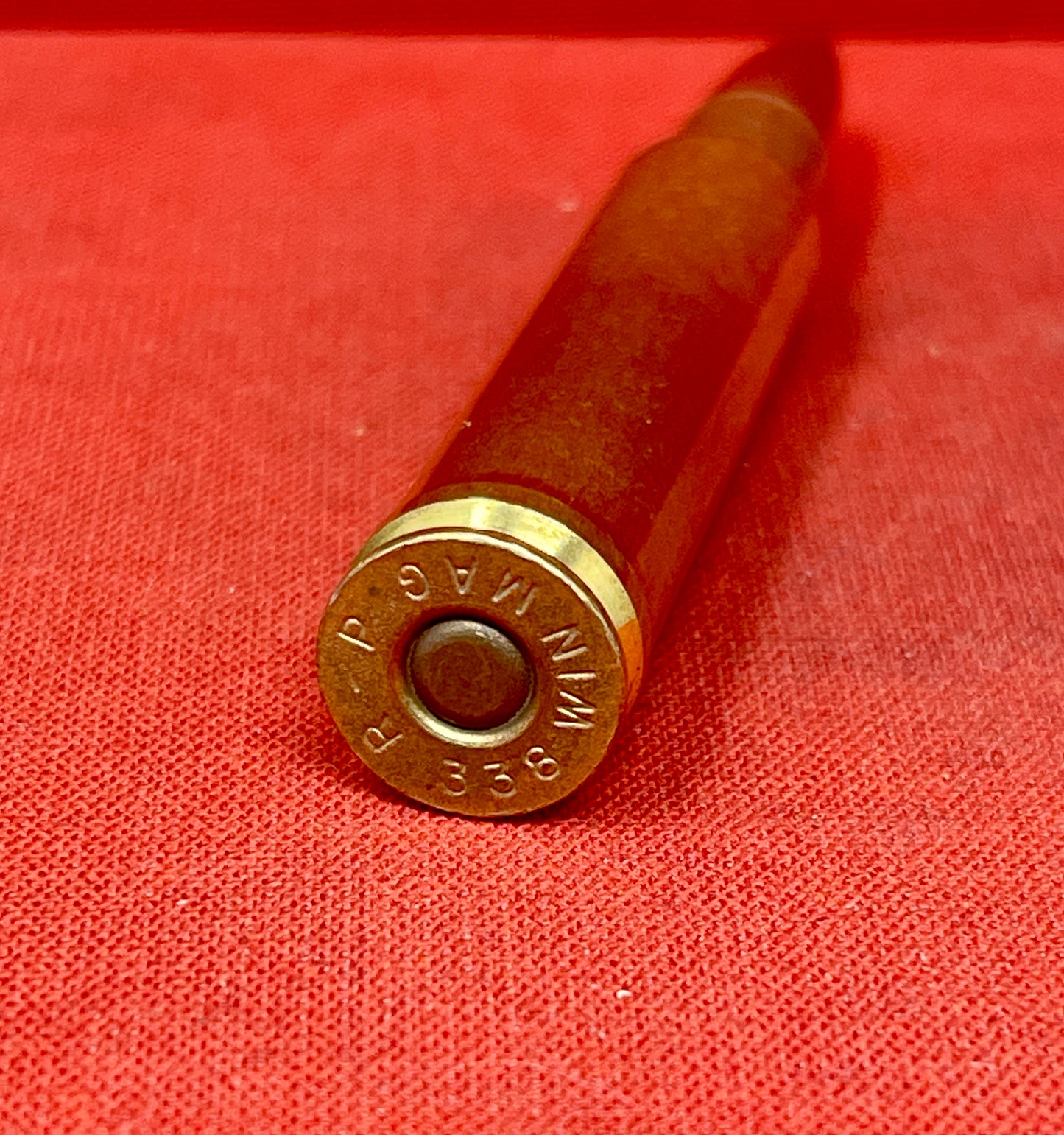 Explore the INERT RP .338 Winchester Magnum Round, a high-quality dummy cartridge ideal for collectors, firearm function testing, and historical displays.