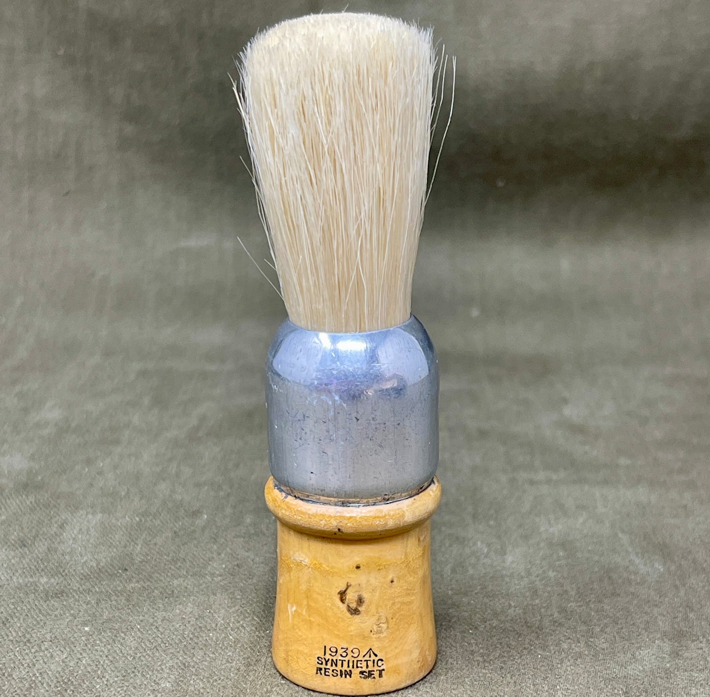 Shop this original 1939-dated Henderson Bros WW2 British Army shaving brush. Warranted bristle, military-issued, and ideal for collectors of wartime memorabilia.