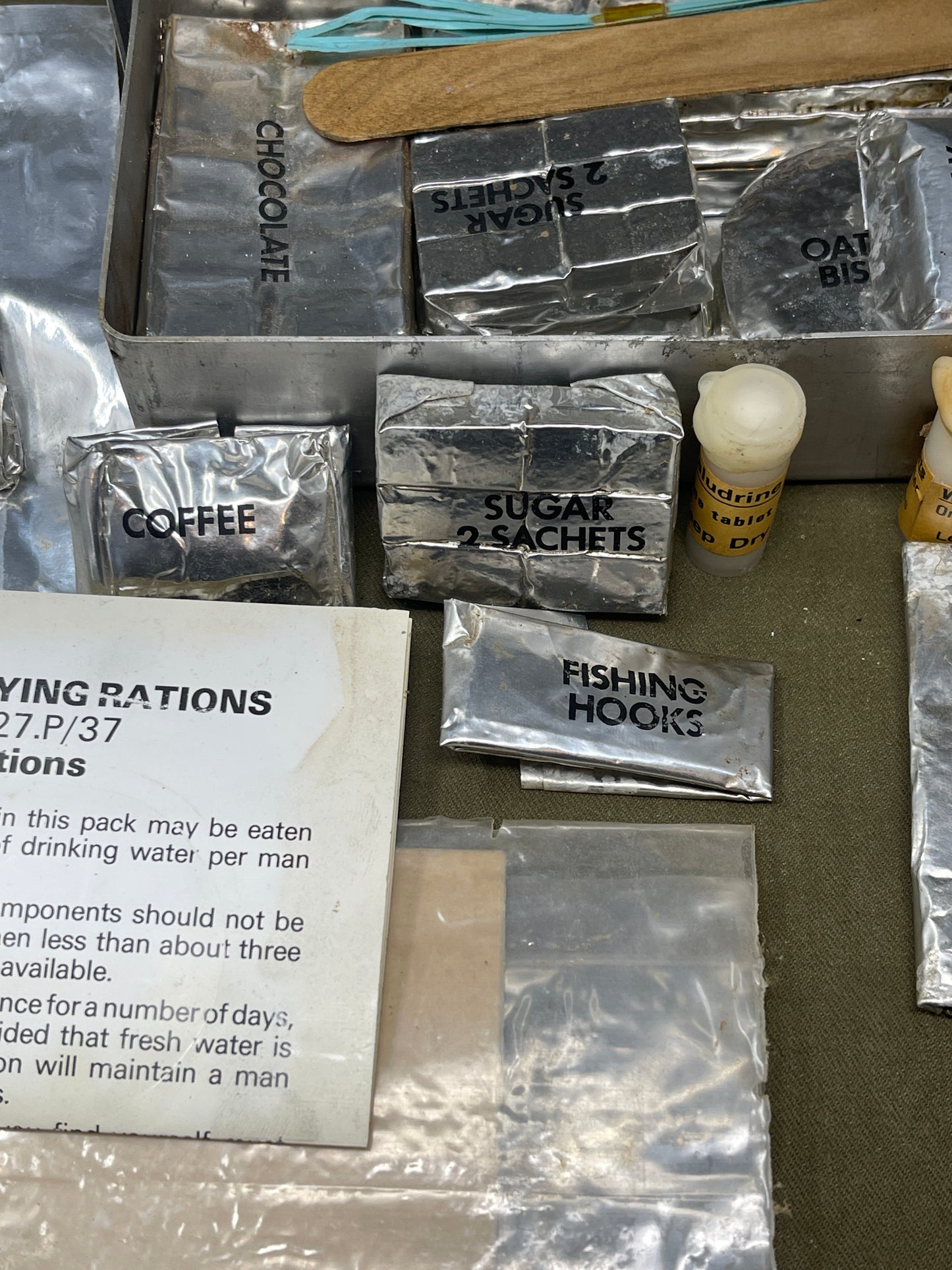 Shop a complete Royal Air Force Mark VIII Emergency Flying Rations tin (27P P.D/74). Rare WW2 survival kit issued to RAF aircrew—perfect for collectors.