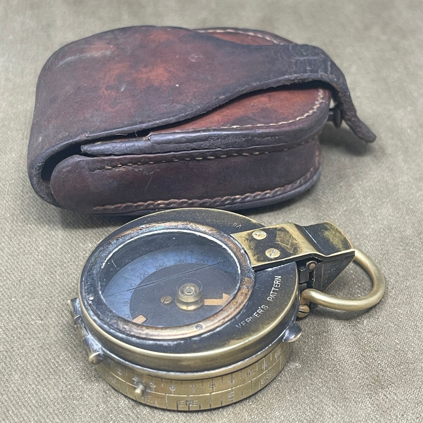 Authentic 1916 British WWI military compass by Cruchon & Emons, London. Excellent condition with original leather case. A rare and collectible Great War navigation instrument.