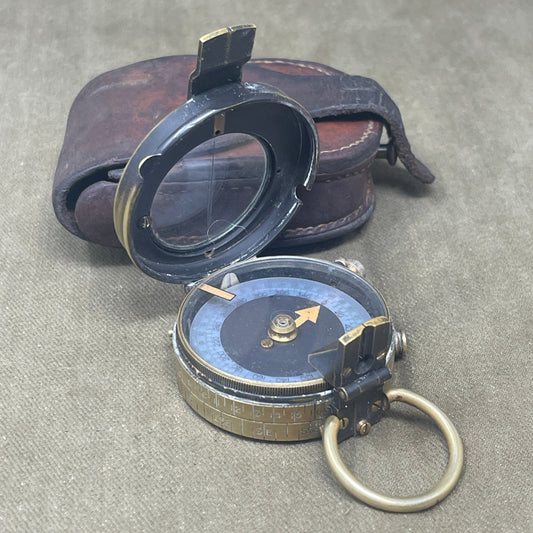 Authentic 1916 British WWI military compass by Cruchon & Emons, London. Excellent condition with original leather case. A rare and collectible Great War navigation instrument.
