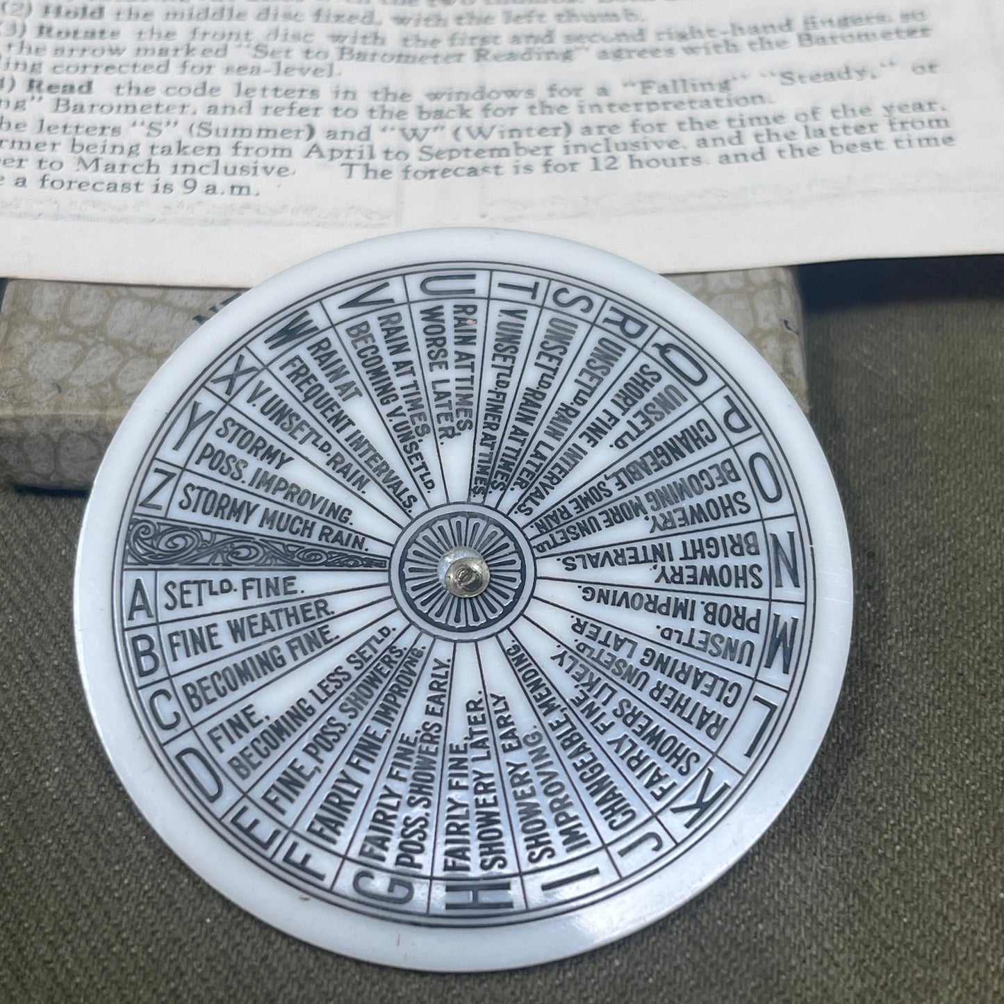 Circular object with text design on a book