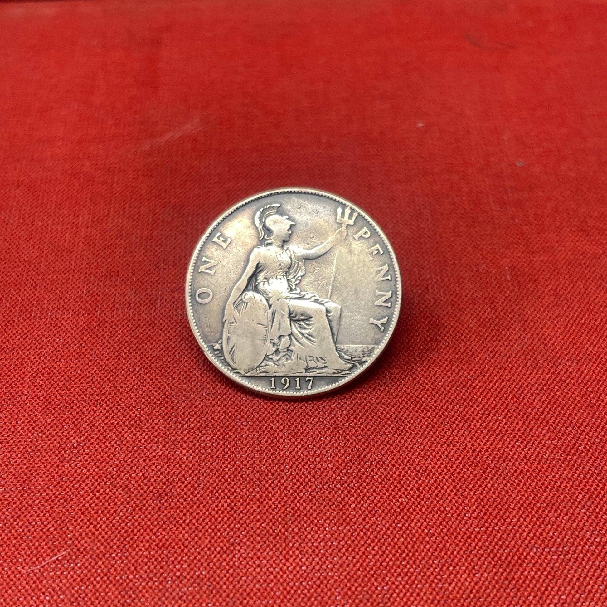 Explore the history and collectability of the King George V One Penny dated 1936. Perfect for numismatists and history enthusiasts seeking an authentic piece of British coinage.