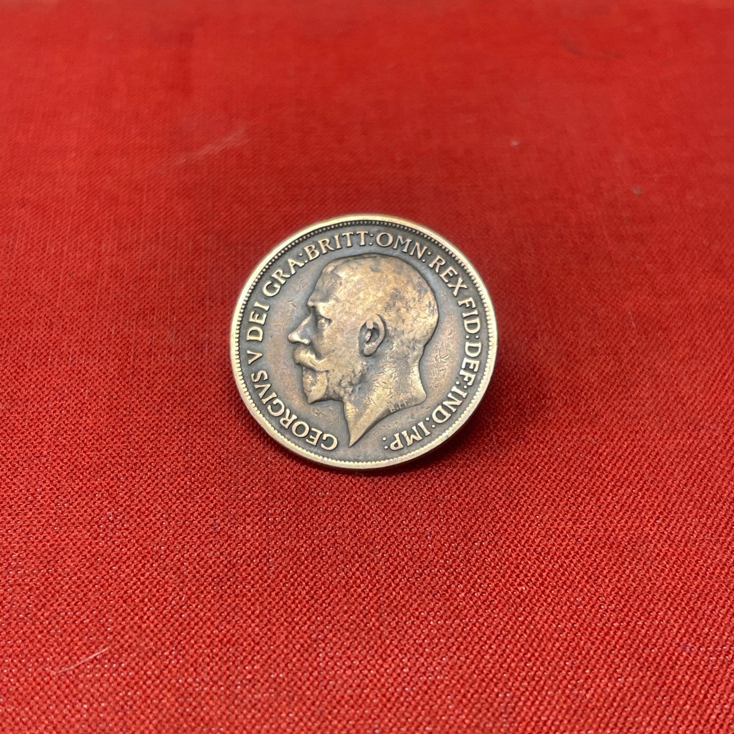 Explore the history and collectability of the King George V One Penny dated 1936. Perfect for numismatists and history enthusiasts seeking an authentic piece of British coinage.