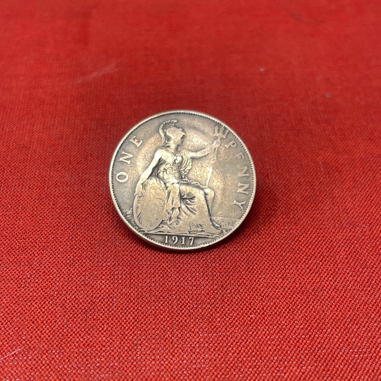 Explore the history and collectability of the King George V One Penny dated 1936. Perfect for numismatists and history enthusiasts seeking an authentic piece of British coinage.