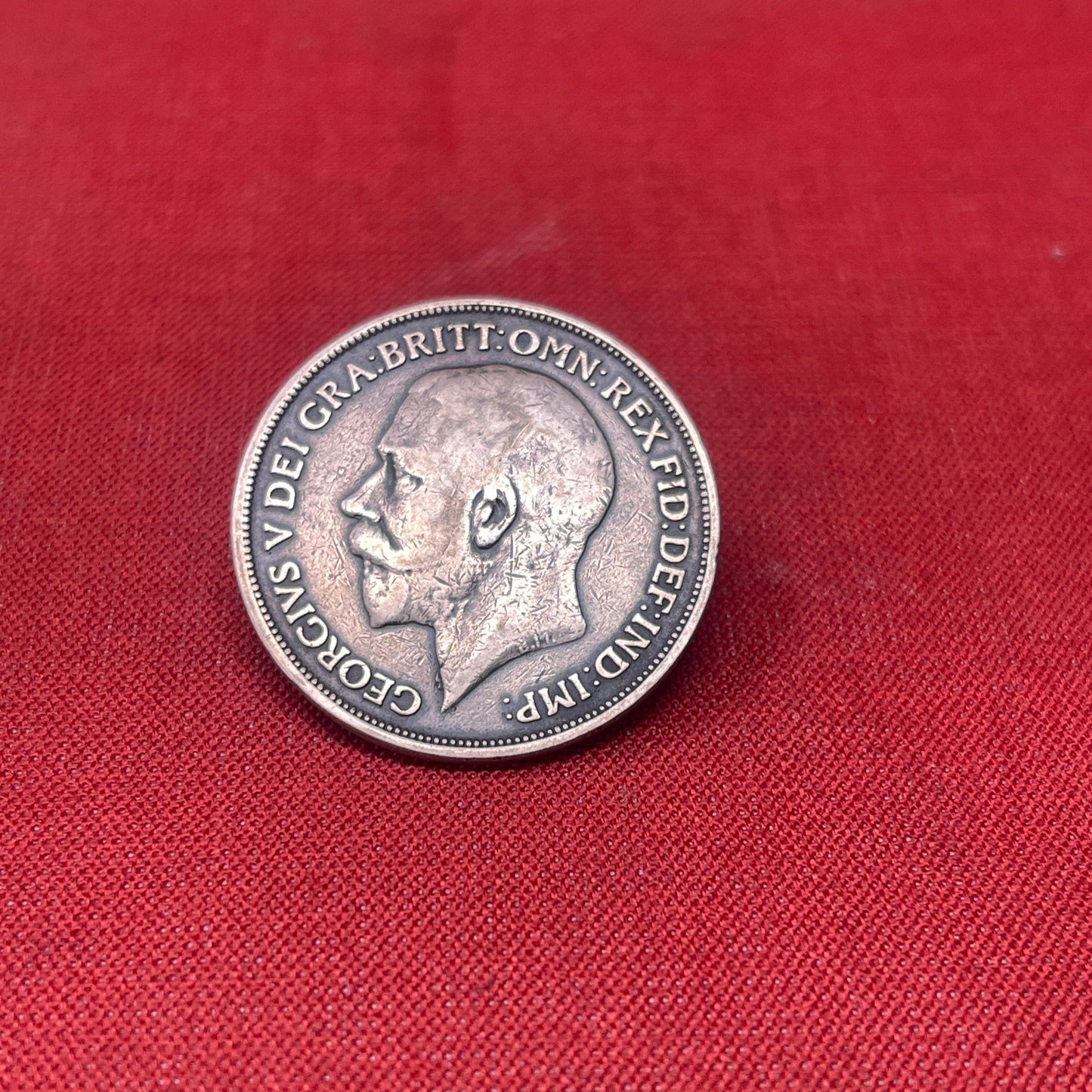 Explore the history and collectability of the King George V One Penny dated 1936. Perfect for numismatists and history enthusiasts seeking an authentic piece of British coinage.