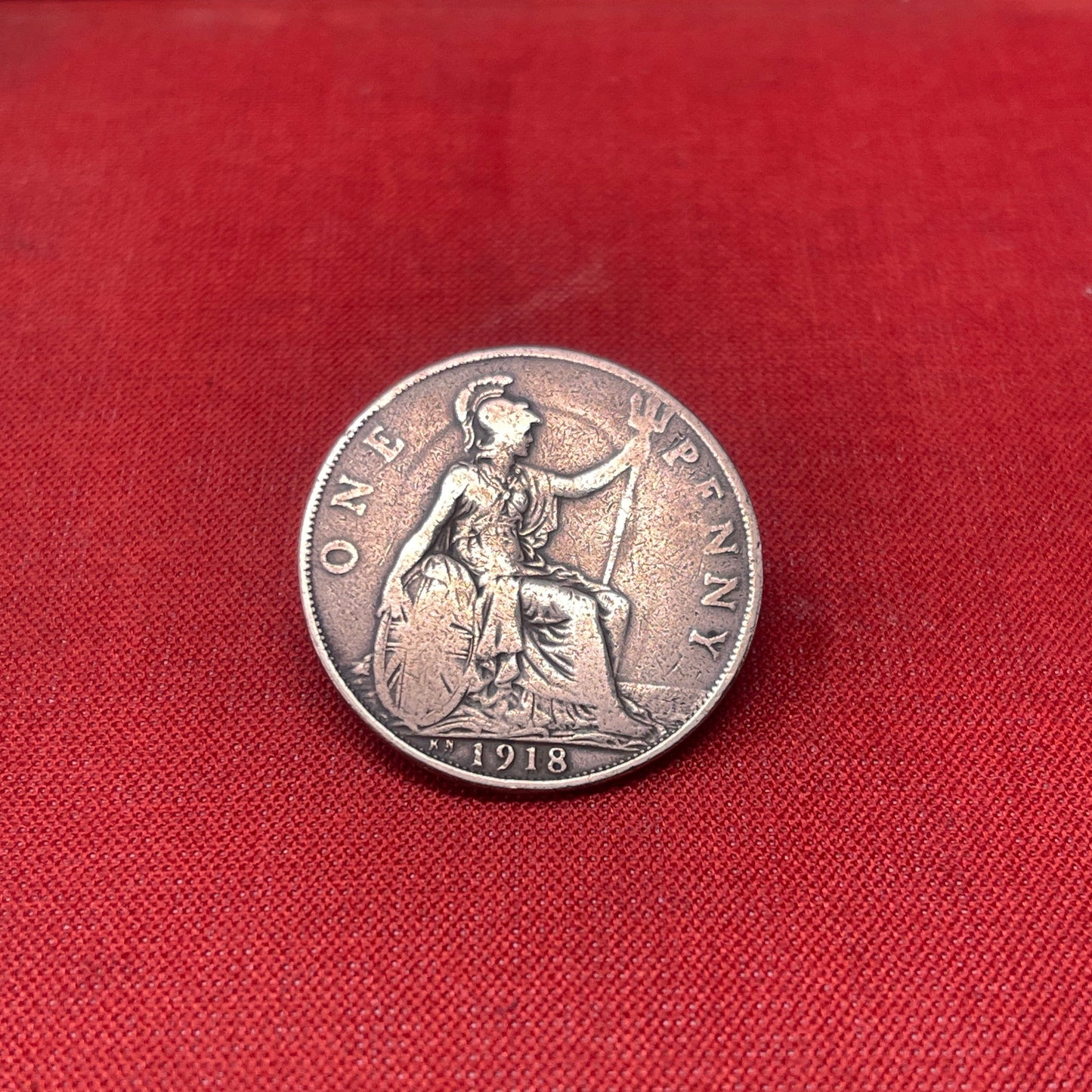 Explore the history and collectability of the King George V One Penny dated 1936. Perfect for numismatists and history enthusiasts seeking an authentic piece of British coinage.