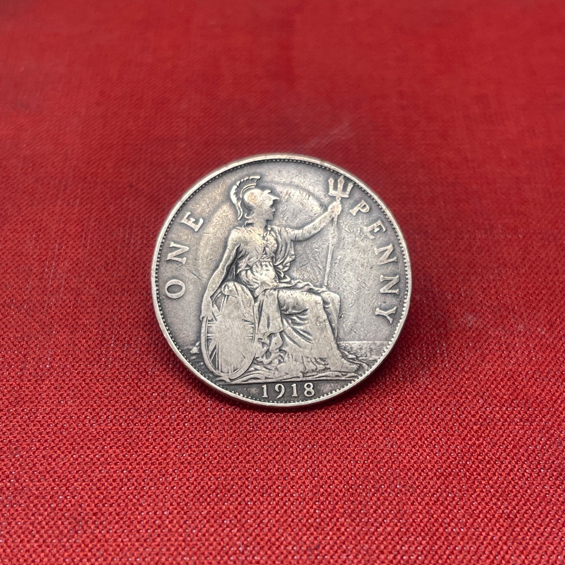 Explore the history and collectability of the King George V One Penny dated 1936. Perfect for numismatists and history enthusiasts seeking an authentic piece of British coinage.