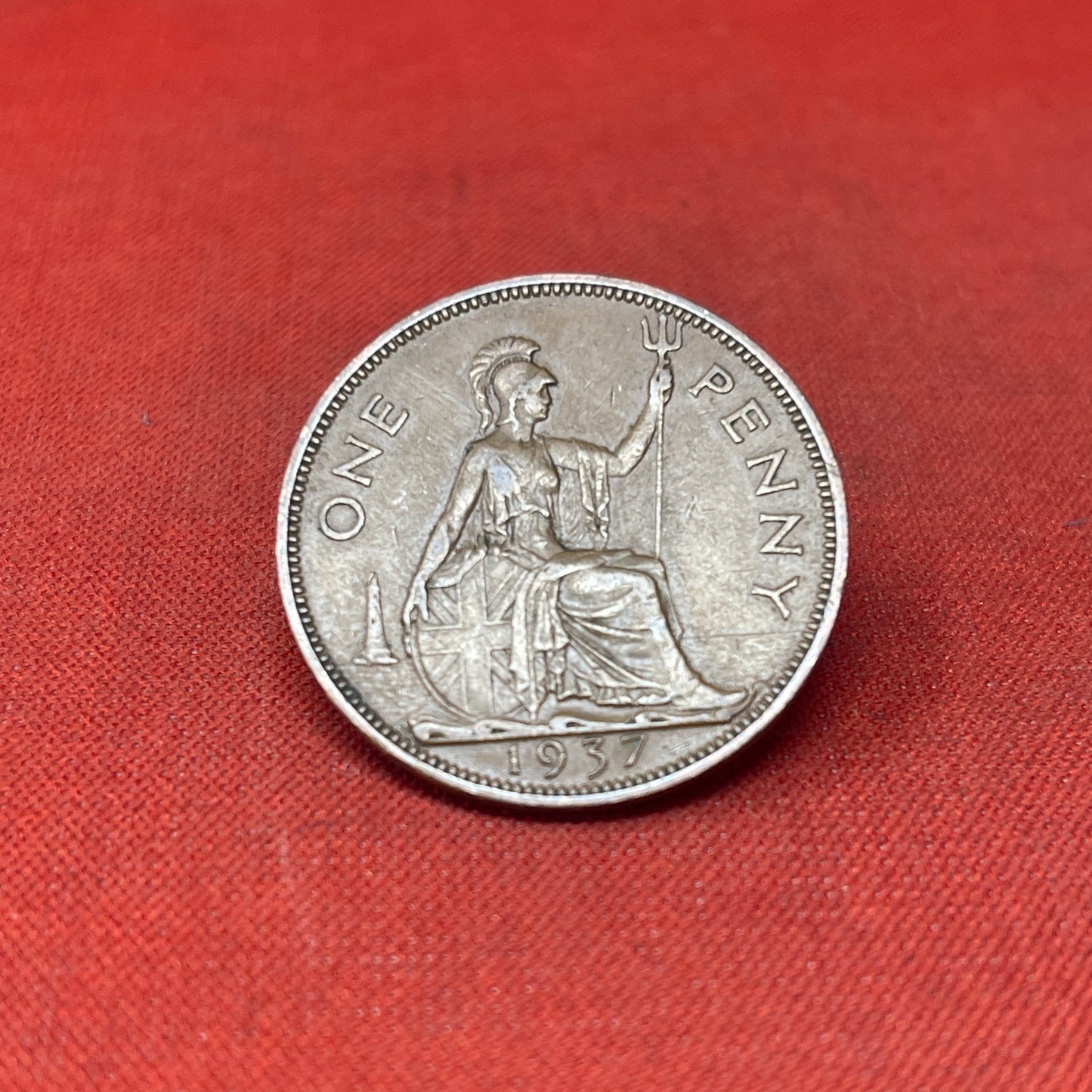 Explore the historical significance of the King George VI One Penny coin, minted from 1937 to 1952. Ideal for collectors and history enthusiasts seeking an authentic piece of British numismatic heritage
