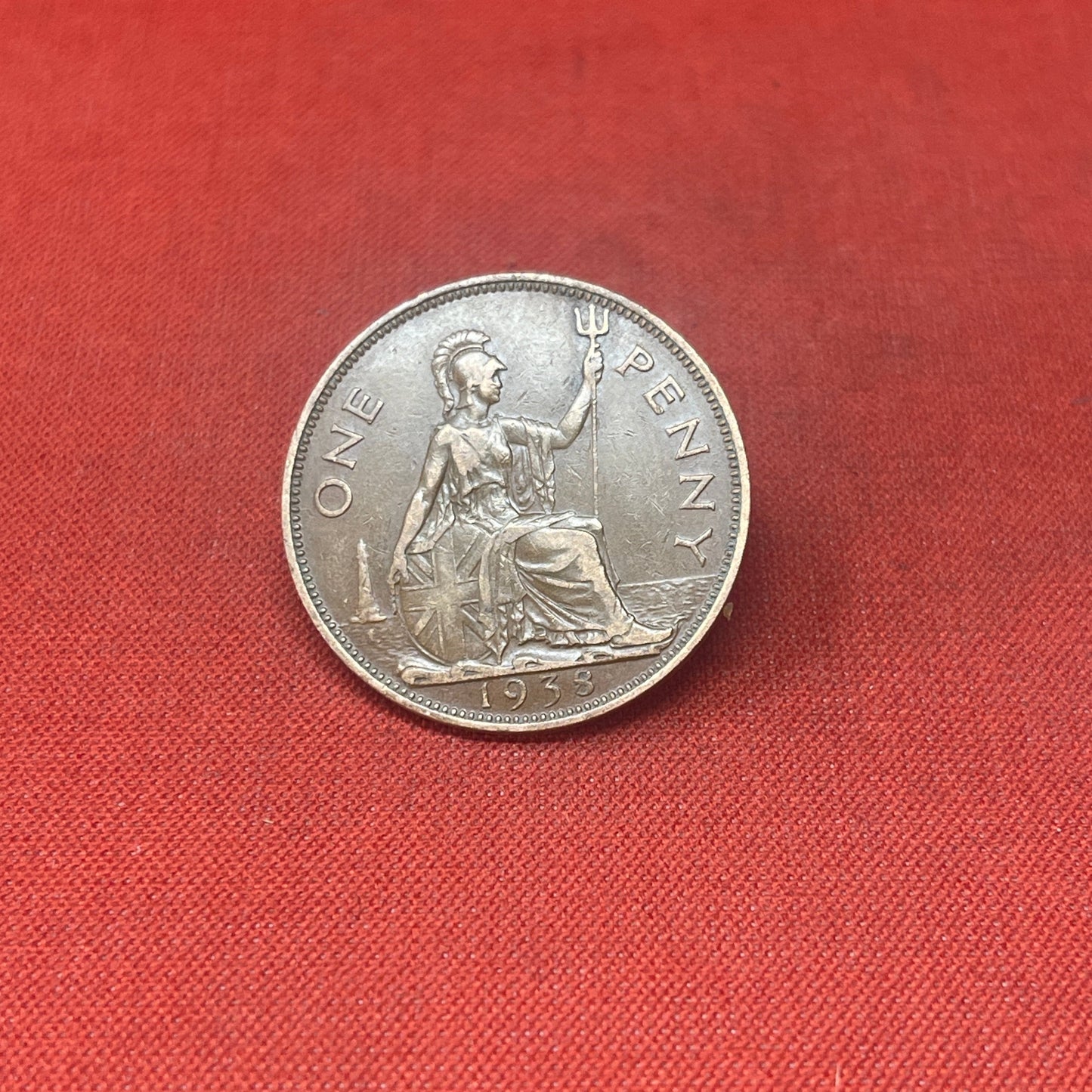 Explore the historical significance of the King George VI One Penny coin, minted from 1937 to 1952. Ideal for collectors and history enthusiasts seeking an authentic piece of British numismatic heritage