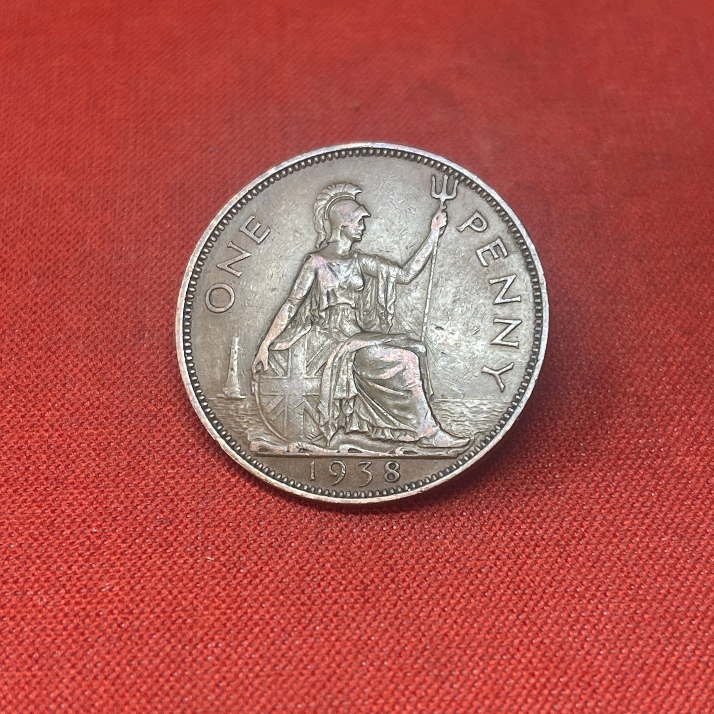 Explore the historical significance of the King George VI One Penny coin, minted from 1937 to 1952. Ideal for collectors and history enthusiasts seeking an authentic piece of British numismatic heritage
