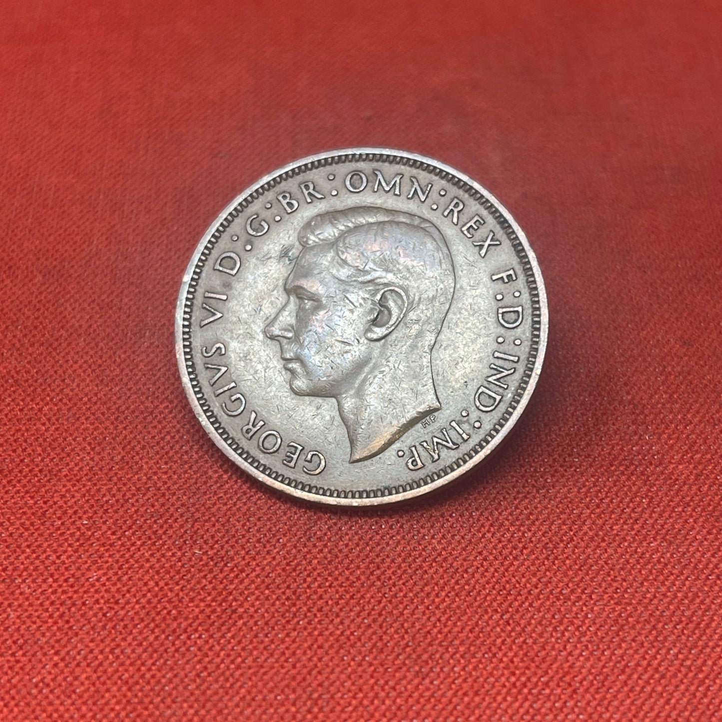 Explore the historical significance of the King George VI One Penny coin, minted from 1937 to 1952. Ideal for collectors and history enthusiasts seeking an authentic piece of British numismatic heritage