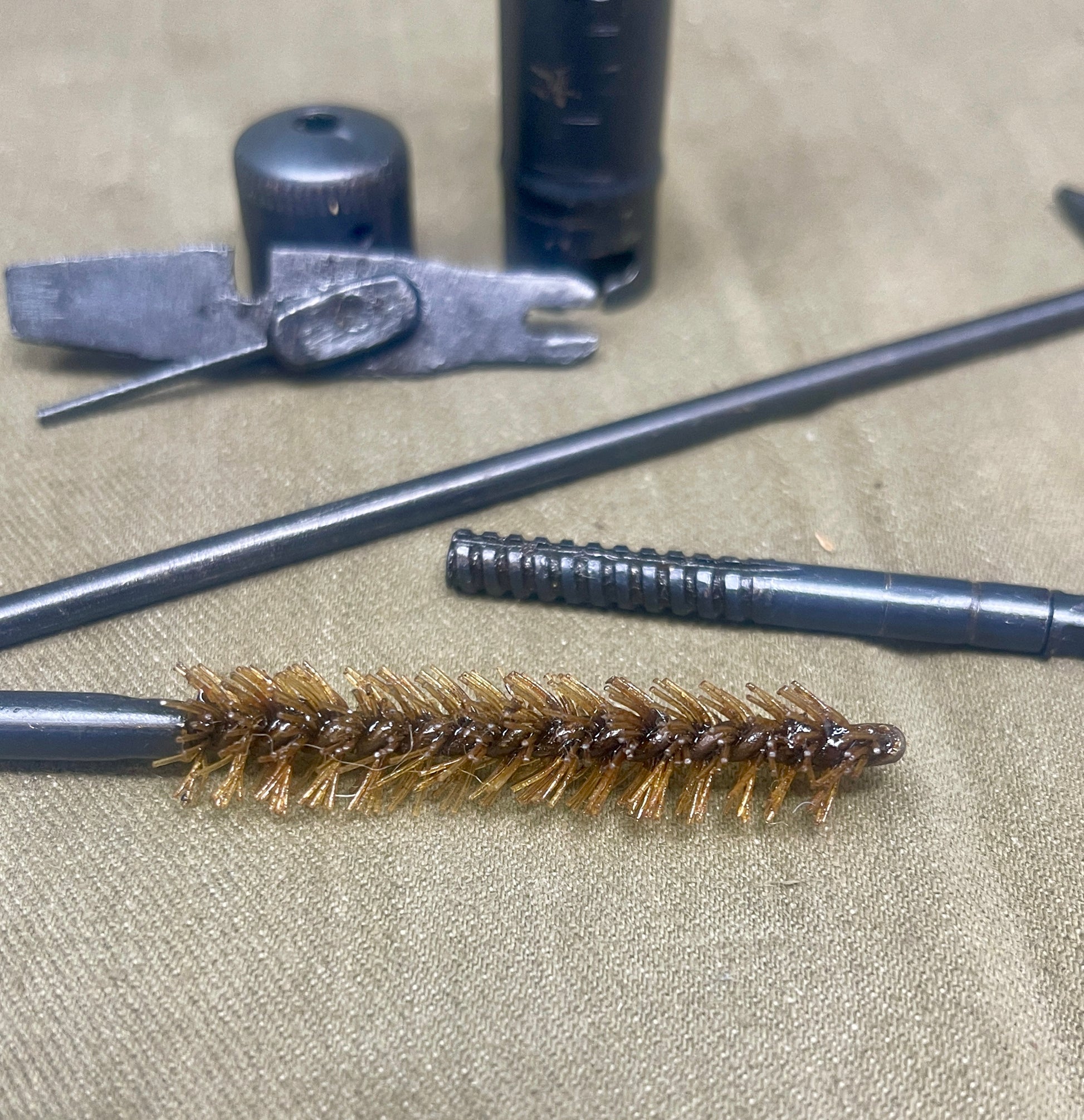 Metal cleaning brushes and tools on a textured surface