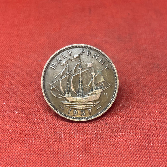 Explore the historical significance of the King George VI 1937 Half Penny. This iconic coin features the Golden Hind and the portrait of George VI, perfect for collectors and history enthusiasts