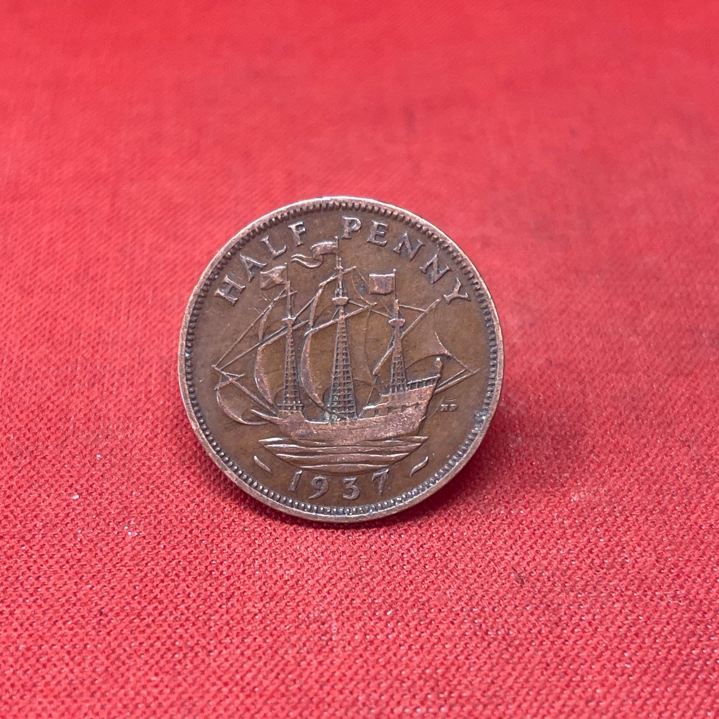 Explore the historical significance of the King George VI 1937 Half Penny. This iconic coin features the Golden Hind and the portrait of George VI, perfect for collectors and history enthusiasts