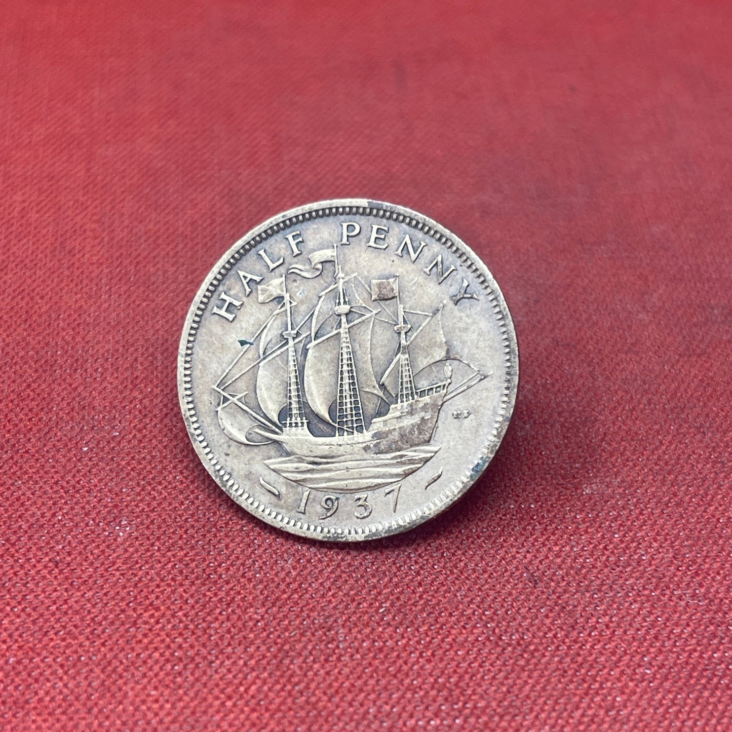 Explore the historical significance of the King George VI 1937 Half Penny. This iconic coin features the Golden Hind and the portrait of George VI, perfect for collectors and history enthusiasts