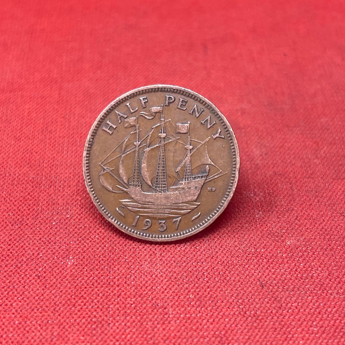 Explore the historical significance of the King George VI 1937 Half Penny. This iconic coin features the Golden Hind and the portrait of George VI, perfect for collectors and history enthusiasts