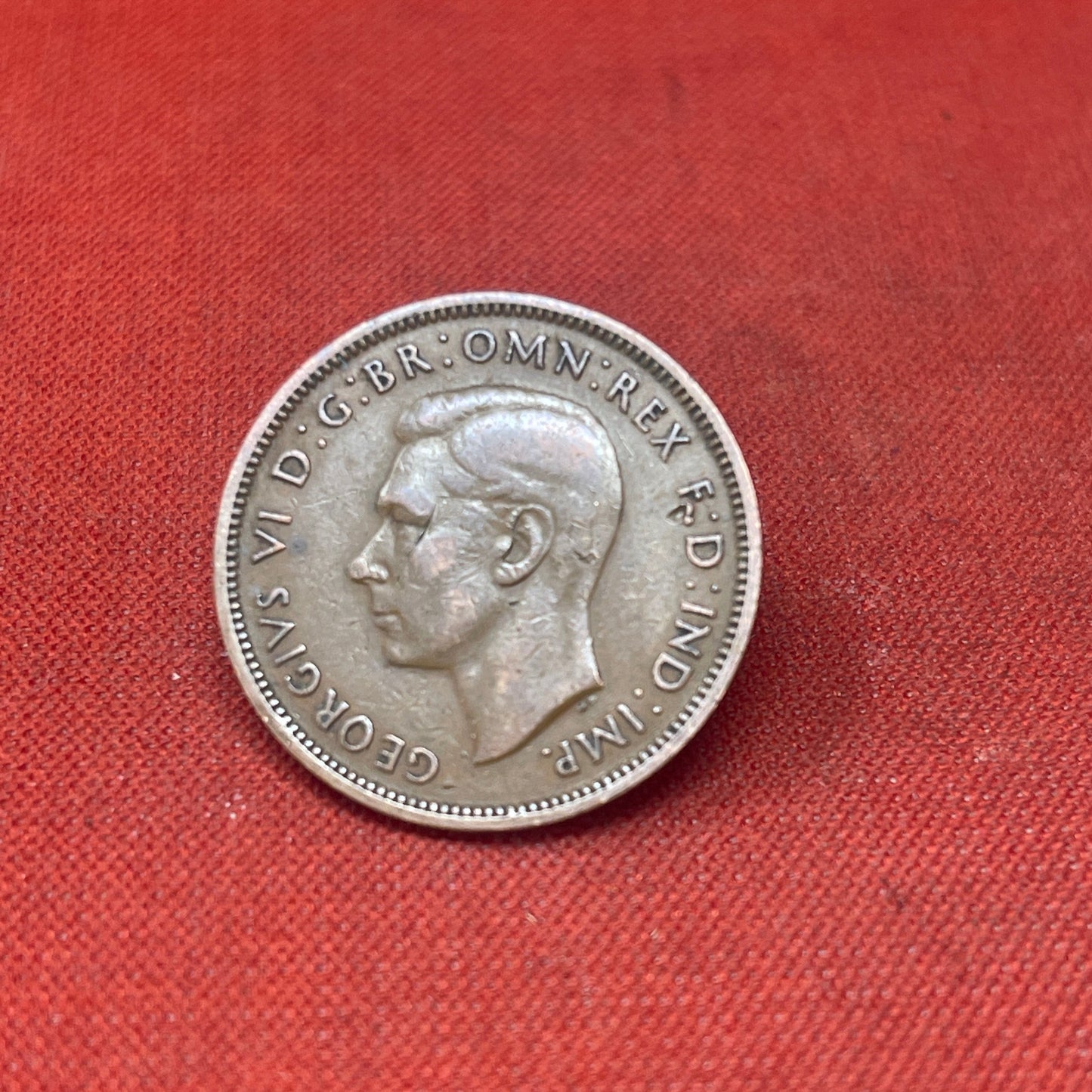 Explore the historical significance of the King George VI 1937 Half Penny. This iconic coin features the Golden Hind and the portrait of George VI, perfect for collectors and history enthusiasts