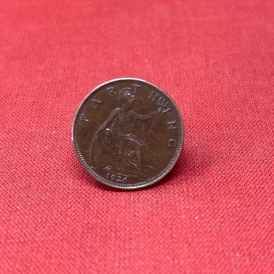 Discover the King George V Farthing, minted from 1911 to 1936. Featuring the iconic Britannia design and King George V's portrait, these historic bronze coins are perfect for collectors and history enthusiasts.