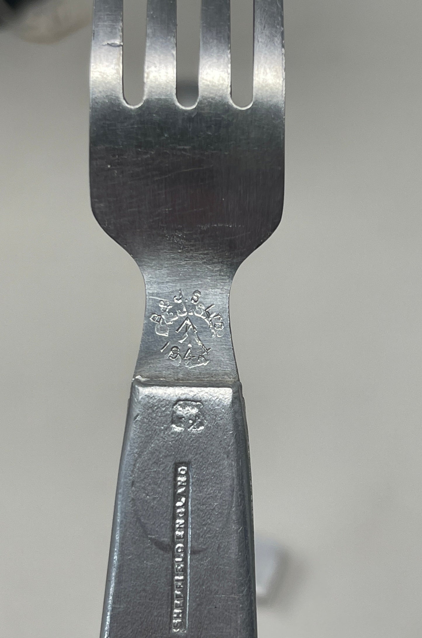Knife, fork, and spoon set dated 1944