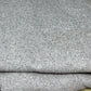 Close-up of gray fabric with a textured pattern