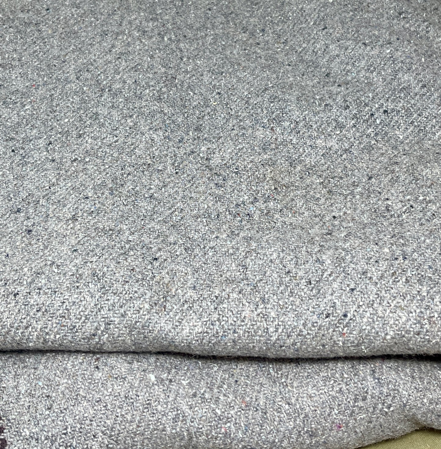 Close-up of gray fabric with a textured pattern