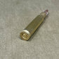 Bullet casing on a textured surface