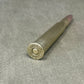 Bullet with 'Holland & Holland' branding on a gray surface