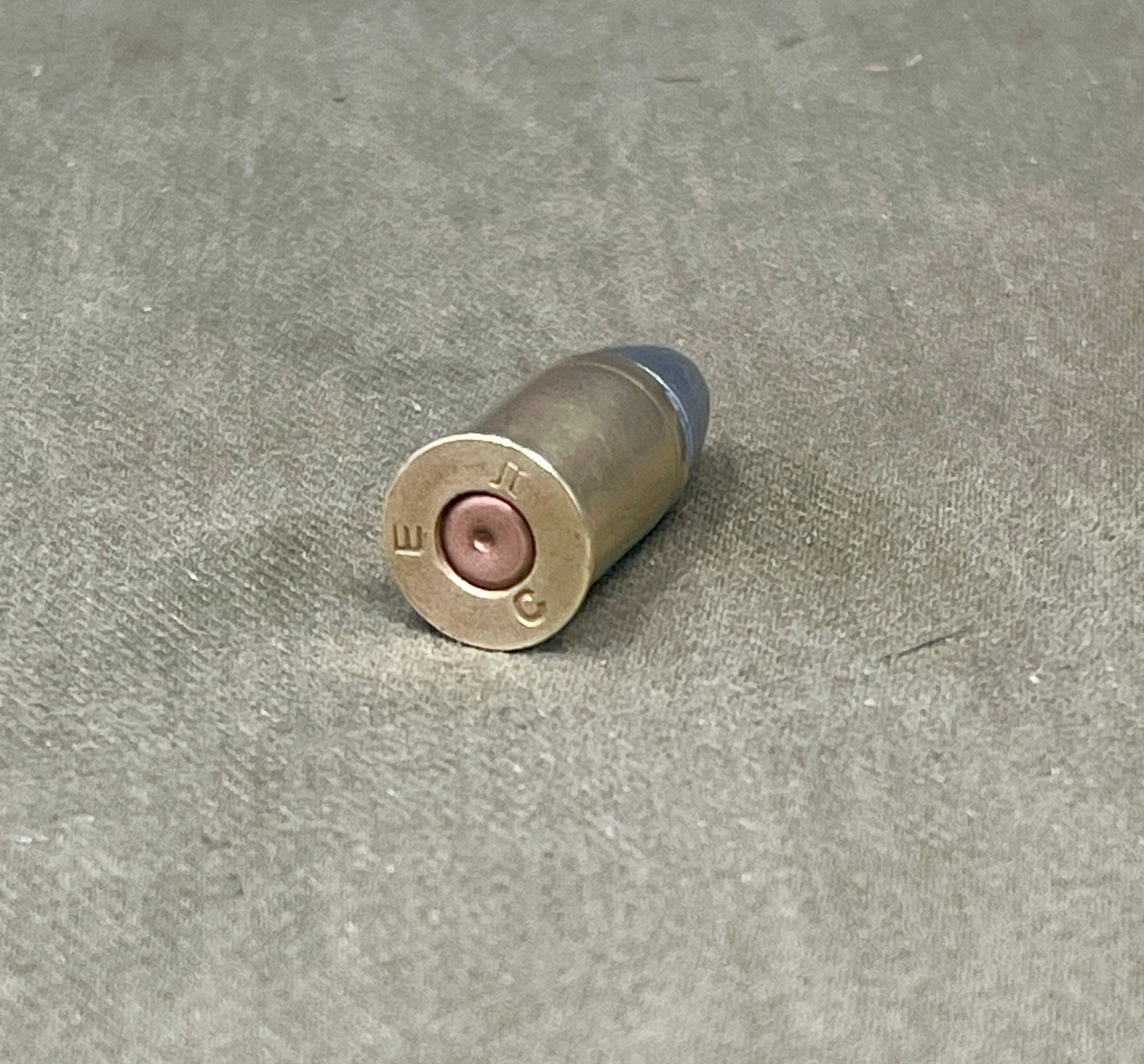 Bullet casing on a concrete surface