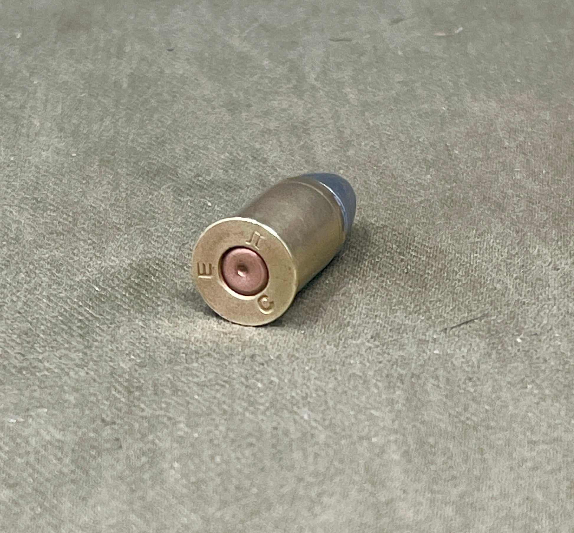 Bullet casing on a concrete surface