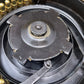 Close-up of a mechanical component with gears and a wrench