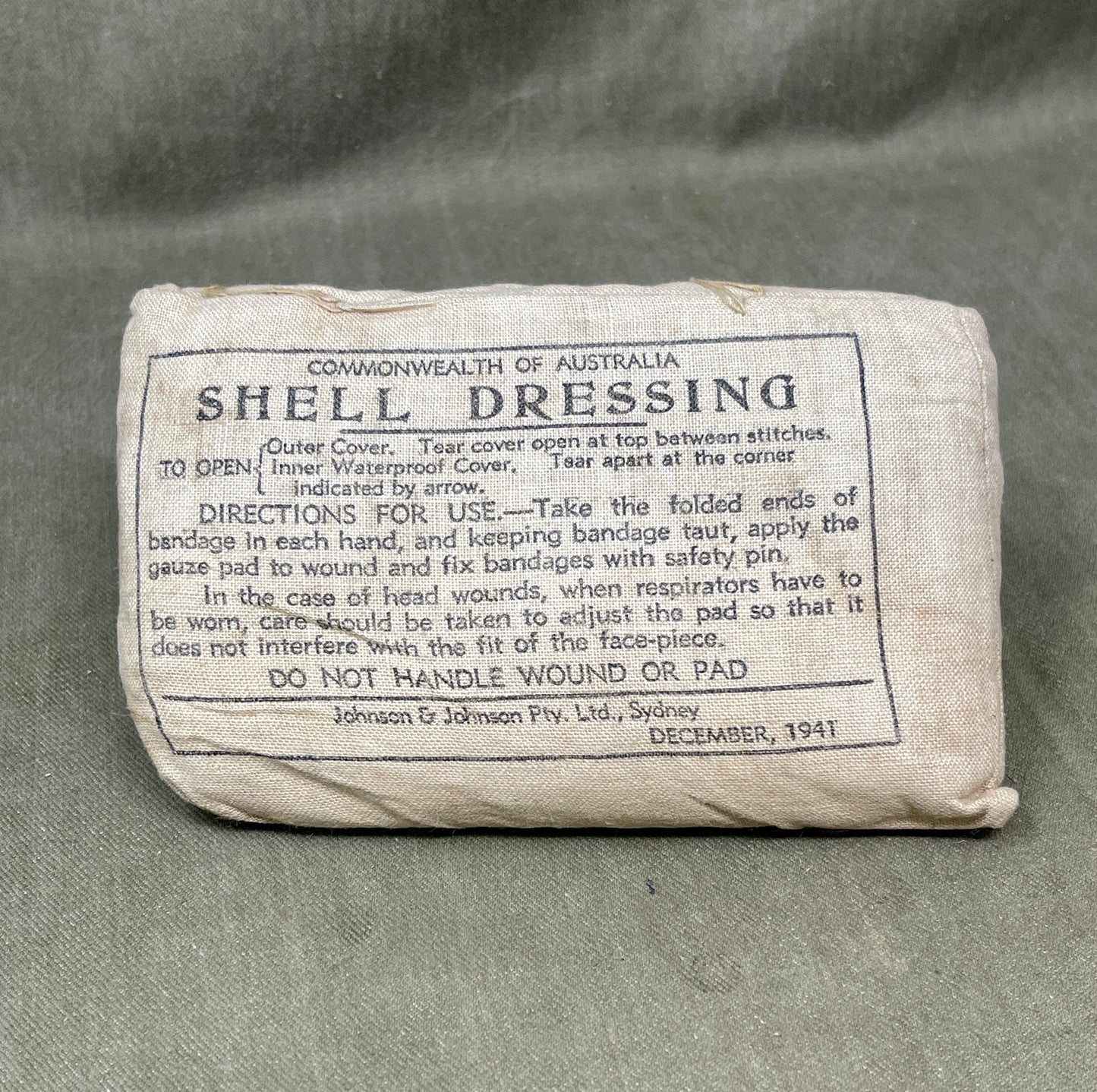 Shell dressing package with text on a gray background