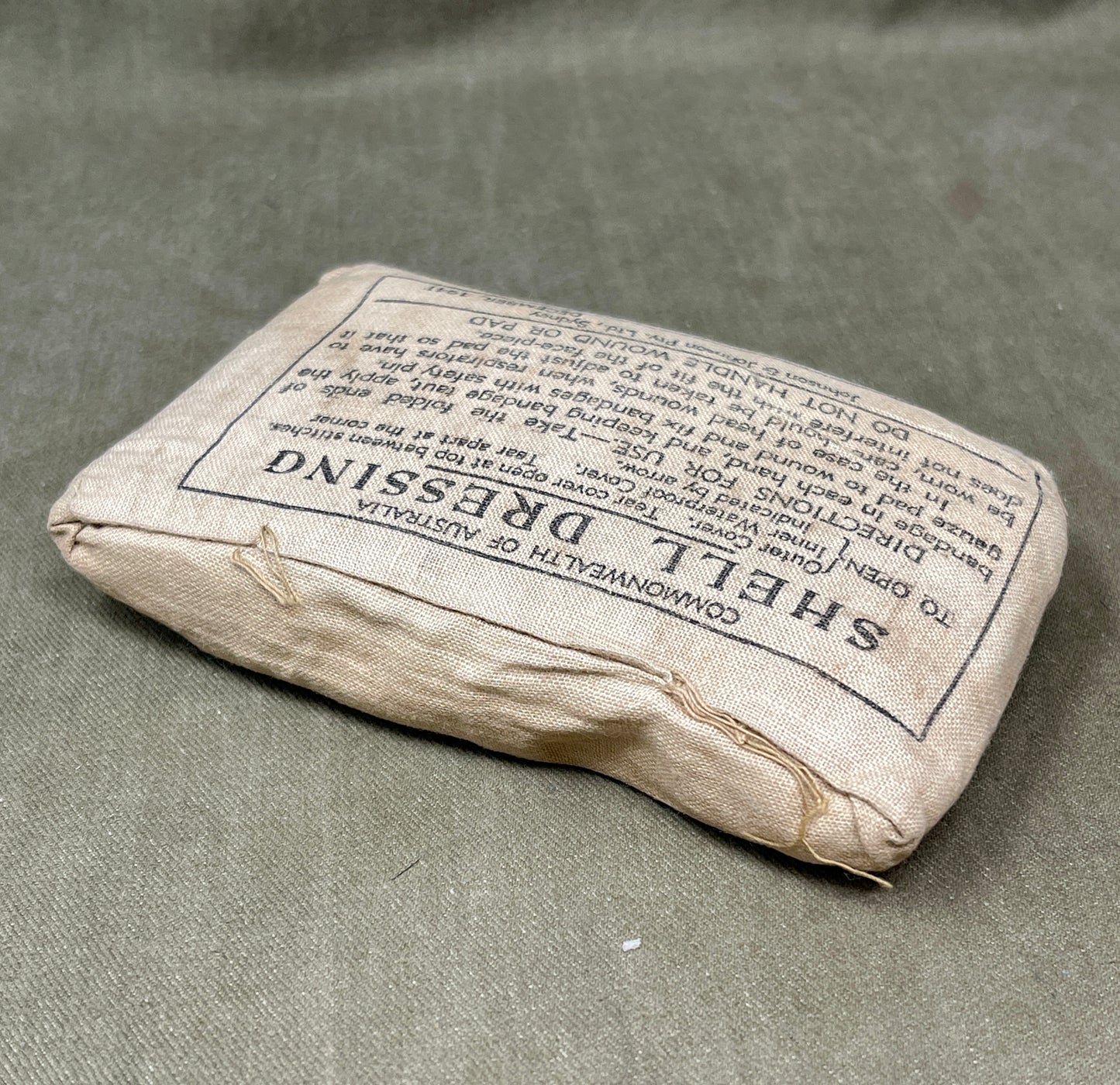 Sheath dressing package with text on a gray background